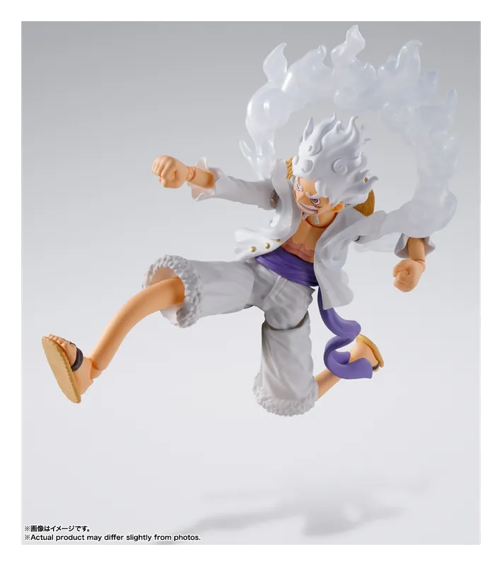 S.H.Figuarts Luffy Gear 5 figure leaping with a white cloud effect behind him