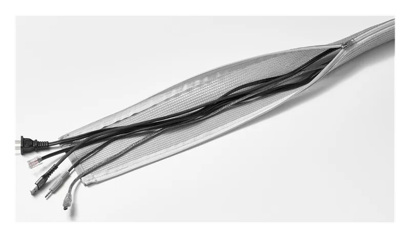 Gray UPLIFT zipped cable sleeve partly open, holding a bundle of cables