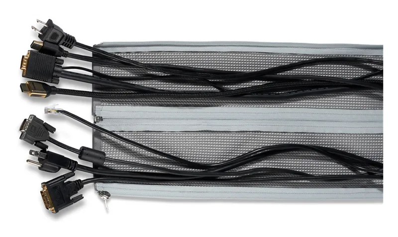 Two UPLIFT zipped cable sleeves filled with computer cables