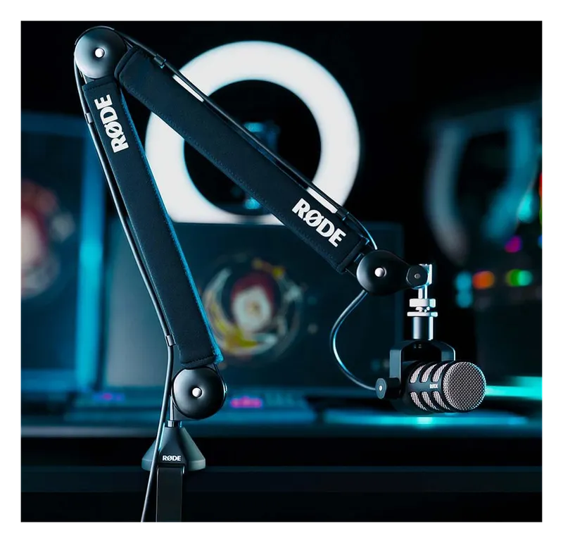 RØDE PSA1+ boom arm holding a RØDE microphone in a studio