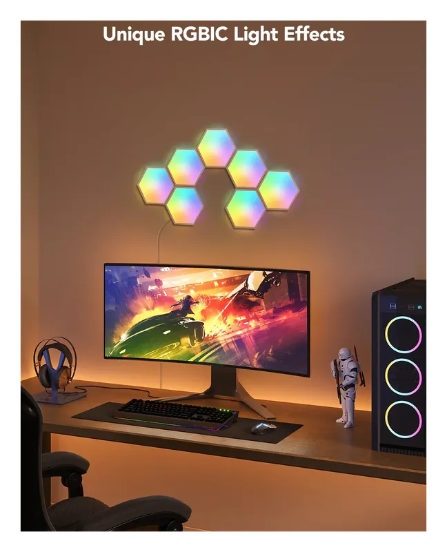 Govee Glide Hexa panels on the wall above a gaming desk