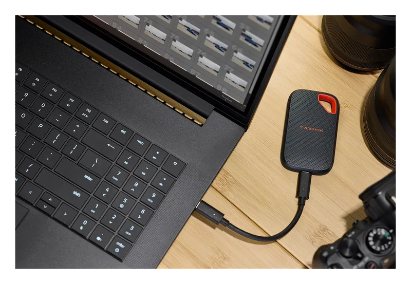 SanDisk Extreme Portable SSD plugged into a laptop by a USB-C cable