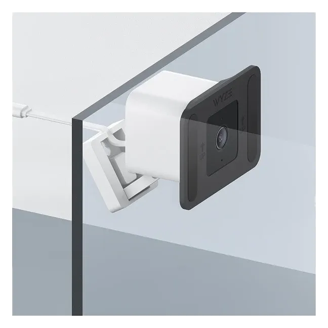 Wyze Window Mount holding a Wyze Cam v3 against a window