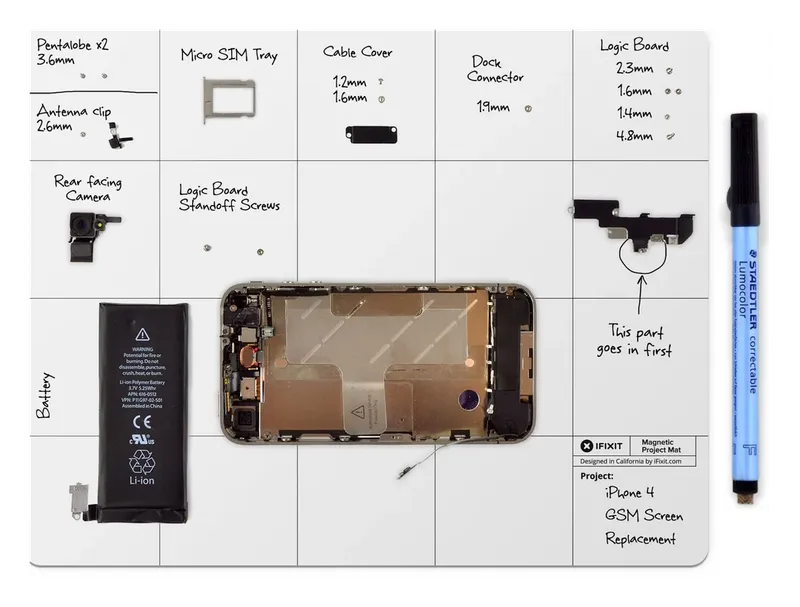 iFixit Magnetic Project Mat organizing phone parts and screws