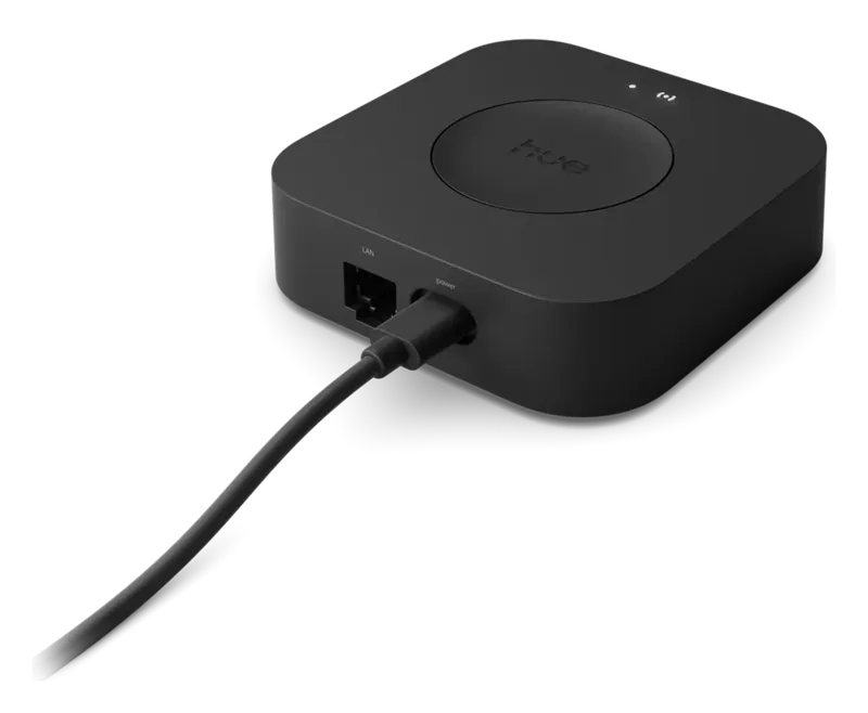 Philips Hue Bridge Pro, angled view with Ethernet cable