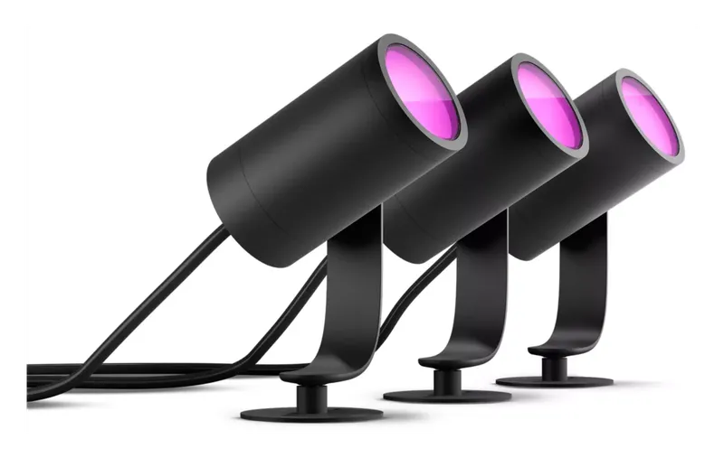 Philips Hue Lily Outdoor Spotlight 3-pack in black, glowing purple