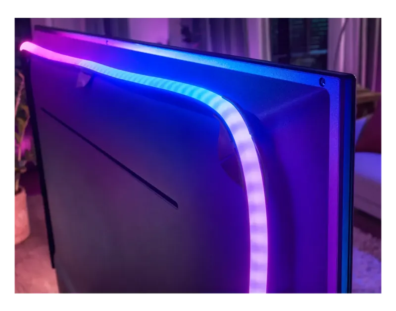 Philips Hue Play Gradient Lightstrip mounted on the back of a TV