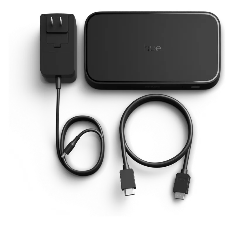 Philips Hue Play HDMI Sync Box 8K with power adapter and HDMI cable