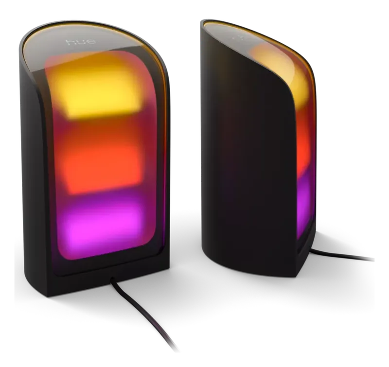 Philips Hue Play Wall Washer pair in black, one glowing orange and purple