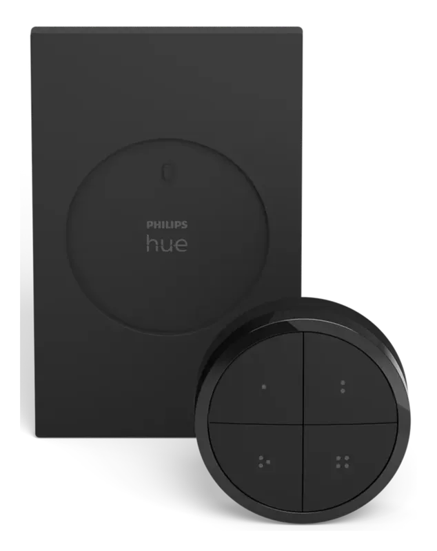 Philips Hue Tap Dial Switch beside its wall plate